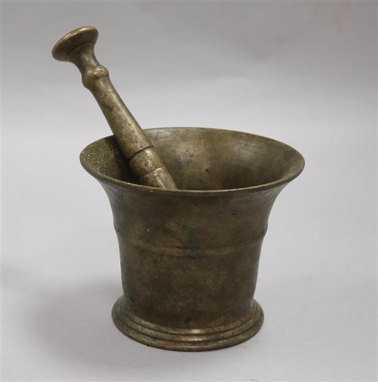 An 18th century bronze pestle and mortar mortar height 12cm